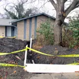 Use of air compressor for trenching around roots at Neil's house